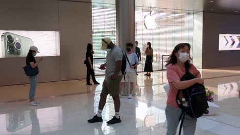 Customers-are-seen-waiting-for-the-Apple-store-to-open-during-the-launch-day-of-the-new-iPhone-14-series-smartphones-in-Hong-Kong