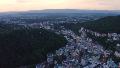 Aerial-View-over-a-Small-European-Town-on-the-Mountain-Side