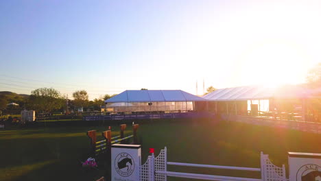 Gorgeous-aerial-footage-of-a-show-jumping-course-at-sunset-on-a-beautiful-California-evening