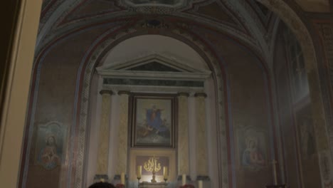 Panning-Shot-of-Refugees-Praying-Together-in-a-Church