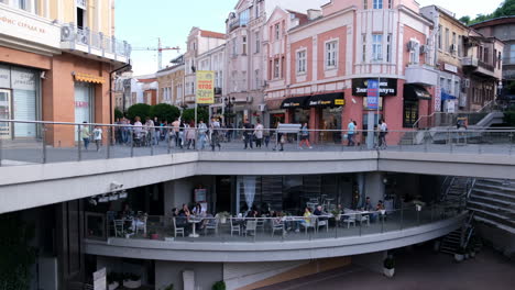People-walking-on-main-street-of-Plovdiv,-European-capital-of-culture-for-2019