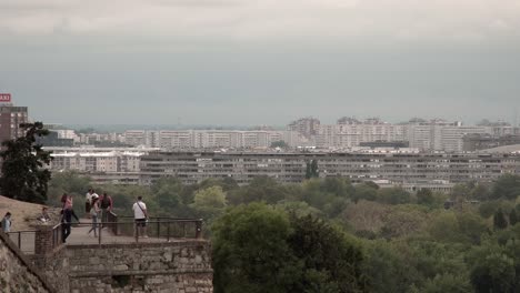 Tourists-viewing-off-a-bridge-in-Belgrade,-Serbia