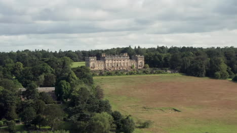 Aerial-Orbit-of-Harewood-House,-a-Country-House-in-West-Yorkshire-from-Right-to-Left-with-Narrow-Crop