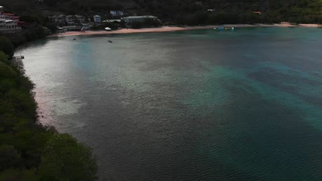 Morne-Rouge-Beach-aerial-footage-with-mountains-in-he-background