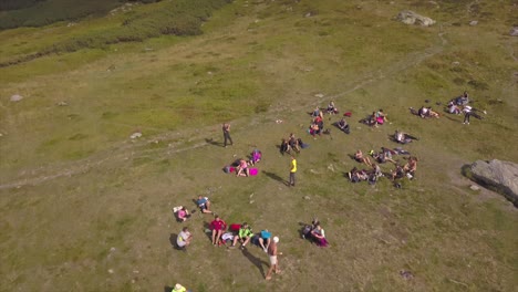 Aerial-view-of-a-large-group-of-people-relax-at-Rodnei-Mountains-National-Park,-Romania