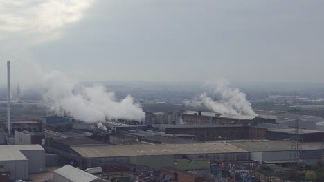 Aerial-view-of-Steam-Emitted-From-DS-Smith,-Kemsley-Paper-Mill,-in-Kemsley,-Kent,-UK