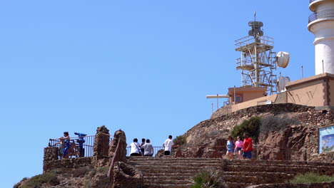 Tourists-visiting-Cabo-de-Gata-lighthouse-in-Almeria,-Spain