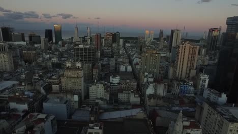 Aerial-view-of-city-with-backgrounds-of-buildings-at-sunset