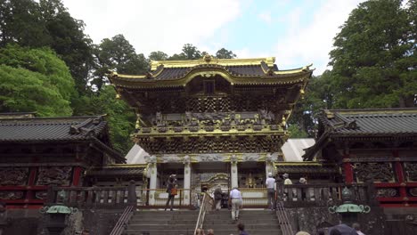Tourists-walk-upstairs-to-the-Toshogu-Shrine-temple-of-Nikko