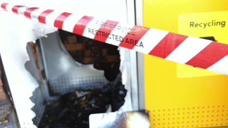 Fire-Service-Restricted-Area-tape-cordons-off-suspected-exploded-bin,-Brisbane-Australia