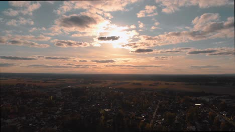 Aerial-footage-of-drone-flying-towards-sunset