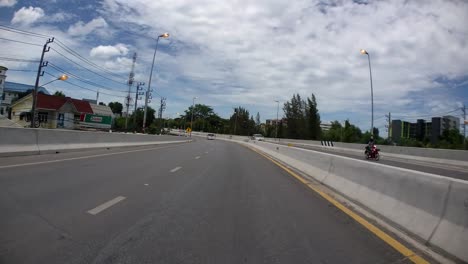 This-is-a-time-lapse-with-an-action-camera-mounted-in-front-of-the-truck,-driving-from-Pranburi-to-Hua-Hin-and-Hua-Hin-to-Bangkok-on-Phet-Kasem-Road