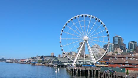 Panoramic-wheel-and-wooden-dock-in-Seattle-city-in-USA