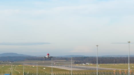 Primer-Plano-Estático-De-Un-Edelweiss-A330-Airbus-Despegando-Del-Aeropuerto-De-Zurich,-Suiza