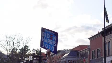 People-celebrating-Joe-Biden's-election-victory-in-the-streets-of-Boulder,-Colorado