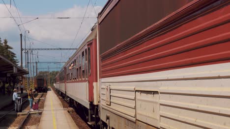 Front-angle-view-of-a-passenger-train-leaving-the-station