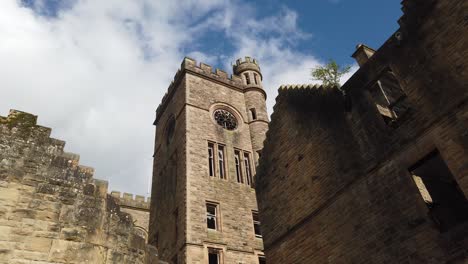 Slow-motion-wide-shot-of-one-of-the-clock-towers-at-Hartwood-Hospital