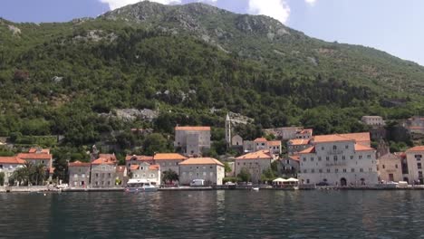 Old-coastal-mediterranean-town-shot-from-cruising-boat