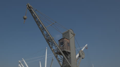 Genoa-old-ancient-port-Porto-Antico,-Bigo-attraction-and-marine-industry-crane-elevator-structure