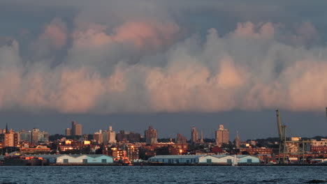 New-York-City,-New-York---September-11,-2020:-The-beauty-of-the-evening-over-the-Hudson-River-with-NYC-in-the-background-and-boats-on-the-Hudson-River