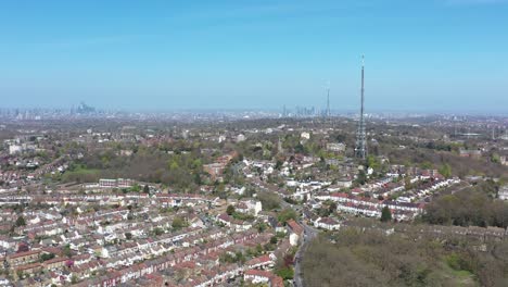 descending-drone-shot-of-two-antenna-in-south-london-Crystal-palace-tower-radio