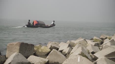 Motor-driven-small-boat-is-moving-ahead-through-the-river-water