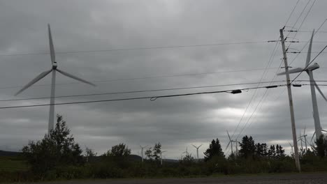 A-ground-of-wind-turbines-working-in-symbiosis-to-bring-electricity-for-communities-in-Gaspesie,-Quebec