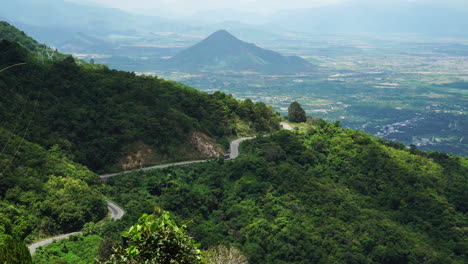 Serene-mountain-road-over-idyllic-valley-in-Ninh-Thuan-Province,-Vietnam