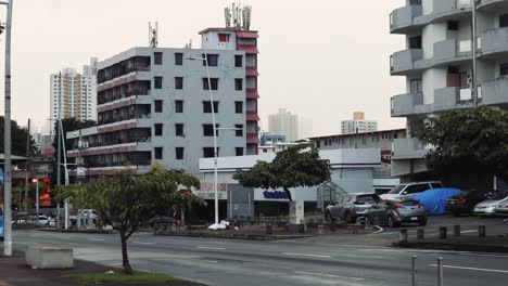 Cars-passing-by-the-road-in-the-city,-there-are-no-people-during-the-pandemic-in-VÃ­a-EspaÃ±a-,-Panama