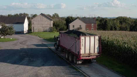 Truck-load-of-animal-feed-is-weighed-on-scales-in-rural-farm-country