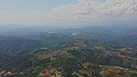 Tanneron-France-Aerial-v21-panoramic-high-angle-orbit-shot-capturing-picturesque-mountainous-scenery-of-peymeinade,-le-tignet,-mandelieu-la-napoule-during-daytime-with-beautiful-cloudscape---July-2021