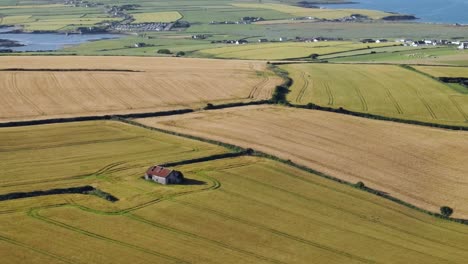 Patchwork-of-fields-and-farms-with-background-of-campsites-and-ocean-views-in-the-area-of-Kinsale's-Old-Head