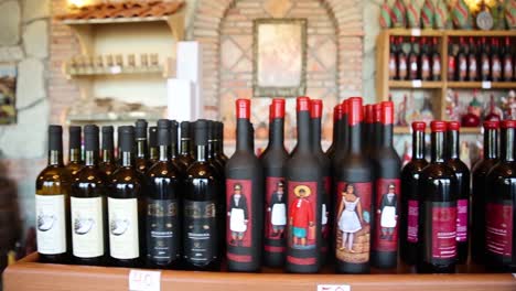 Row-Of-Local-Wine-Bottles-On-Restaurant-Counter-Top-In-Georgia