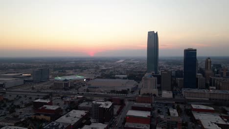 Aerial-view-of-high-rise-and-the-Paycom-center-in-downtown-Oklahoma-city---tracking,-drone-shot