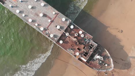 Aerial-Looking-Down-On-Deck-Of-Large-Ship-Beached-At-Gadani