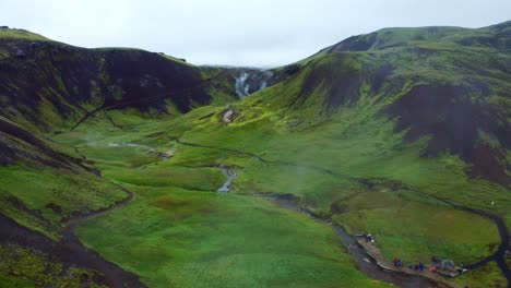 Tourists-At-The-Thermal-River-In-Reykjadalur-Valley-In-South-Coast-Of-Iceland