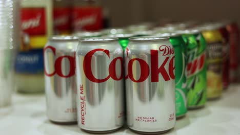 Variety-of-Drink-Brands-and-Flavors-of-Soda-Pop-Cans-on-Table