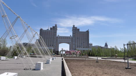 Astana-city-center-pedestrian-walking-around-revealing-modern-neo-futuristic-skyline-of-the-capital