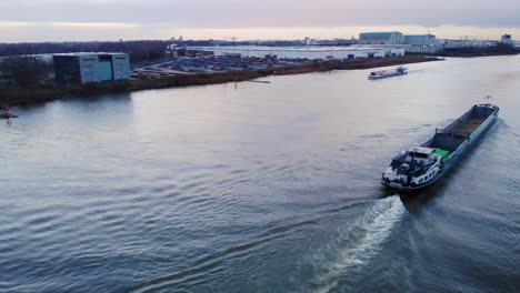 Aerial-Over-Sincero-Cargo-Ship-Travelling-Along-Oude-Maa-Through-Zwijndrecht
