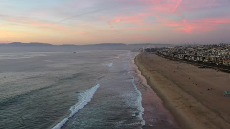 Stretch-Of-Sandy-Beach-With-Calm-Waves-At-Manhattan-Beach-In-Los-Angeles,-California