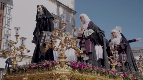 Religious-statues-on-Easter-float-in-Semana-Santa-procession,-Closeup-Detail