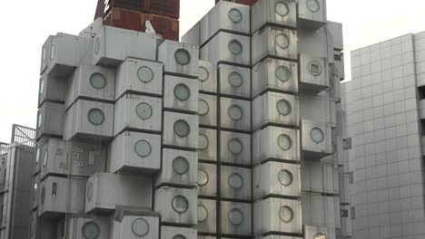 Demolition-works-continue-at-Tokyo's-iconic-Nakagin-Capsule-Tower-in-Ginza-on-April-16,-2022,-in-Tokyo,-Japan