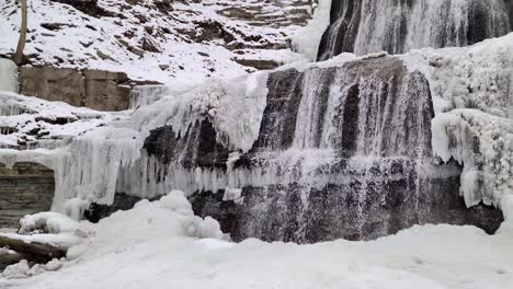 Frozen-Albion-Falls-Cascading-Waterfall-in-Hamilton,-Ontario,-Canada