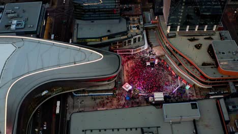 Hundreds-gather-at-the-downtown-Edmonton-Ice-District-Oilers-fans-verses-the-Calgary-Flames-in-an-epic-away-hockey-game-in-the-midst-of-massive-TV-screen-with-stunning-surround-sound-and-visuals-1-2