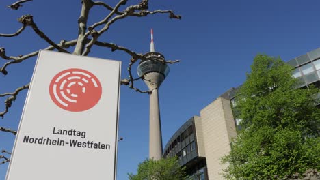 NRW-State-Parliment-Building-with-Rhine-Tower-in-the-Background,-Duesseldorf