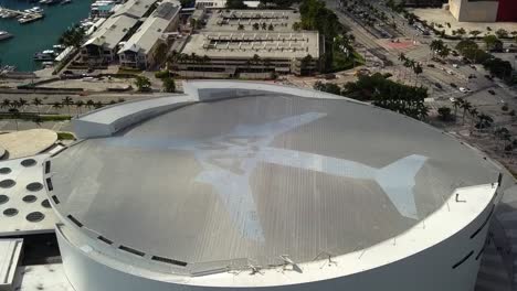 Aerial-drone-view-overlooking-the-FTX-Arena,-in-sunny-Miami,-USA---circling,-drone-shot