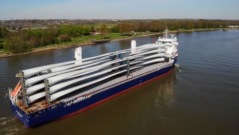 Symphony-Provider-Cargo-Ship-Transporting-Transporting-Wind-Turbine-Propeller-Blades-Along-Oude-Maas