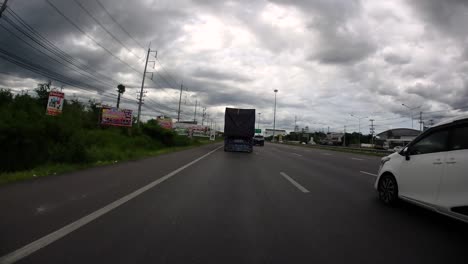 This-is-a-time-lapse-with-an-action-camera-mounted-in-front-of-the-truck,-driving-from-Pranburi-to-Hua-Hin-and-Hua-Hin-to-Bangkok-on-Phet-Kasem-Road