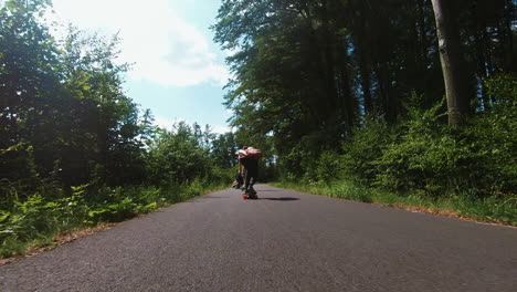 male-person-with-white-high-socks-longboarding