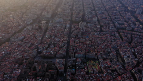 Barcelona-cityscape-aerial-view-at-sunset-with-clouds,-Spain